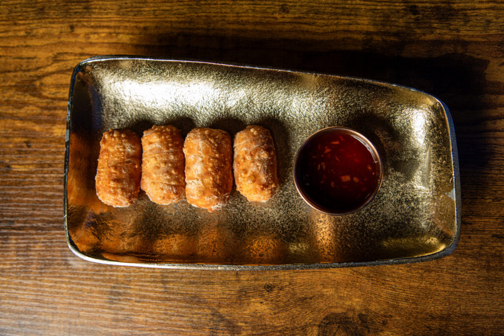 Venezuelan cheese tequeños from Coma Arepas, hand-rolled and deep-fried golden brown